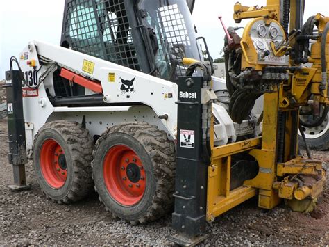 bobcat compact excavator attachments|drilling rig attachments for bobcat.